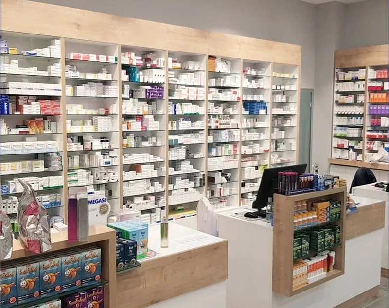 ONI-Shopfitting Modern Retail Space: Wood - Tone Retail Shop Counter & Color - Accent Displays