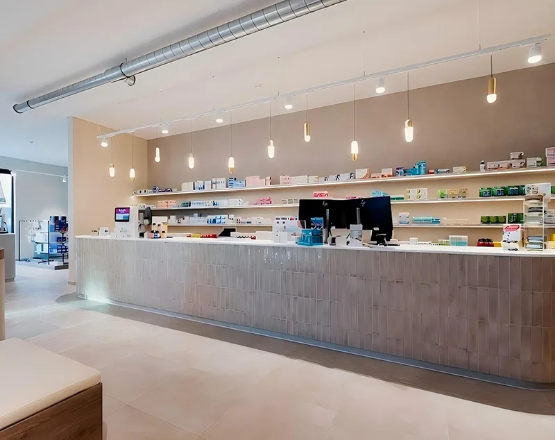ONI-Shopfitting Functional Pharmacy Design: Custom Counter in Store & Smart Racks