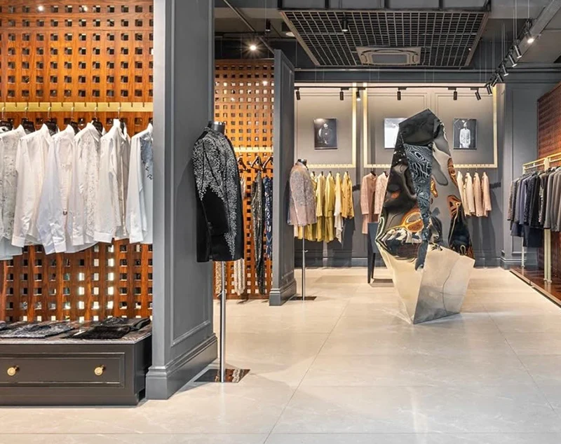 ONI-Shopfitting Sleek Retail Space: Metal - Frame Clothing Racks for Stores & Trendy Displays
