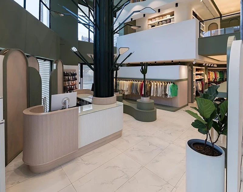 ONI-Shopfitting Contemporary Clothes Shop: Custom Clothes Shop Interior & Functional Displays