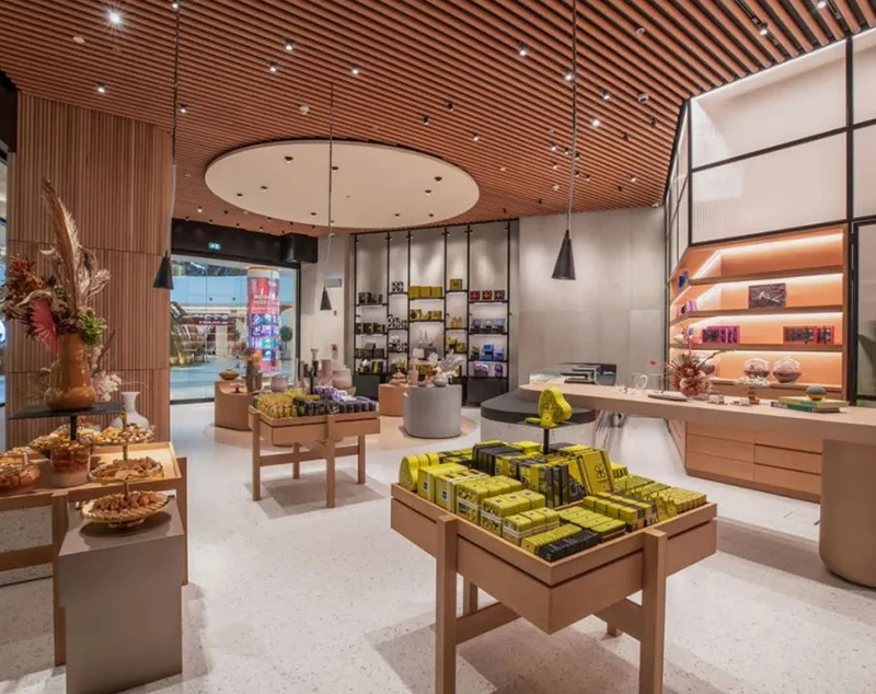 ONI-Shopfitting Natural Wood Shop Shelves Design for Chocolate and Candy Retail in Shopping Centers"