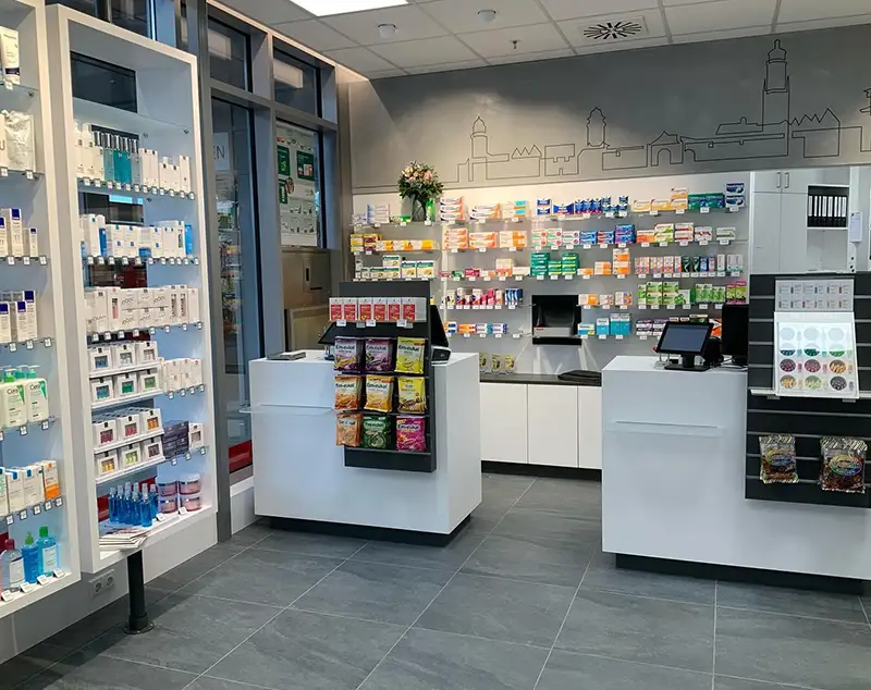 ONI Display Gray-Toned Modern Pharmacy: White-Wood Counters & Cityscape Mural System
