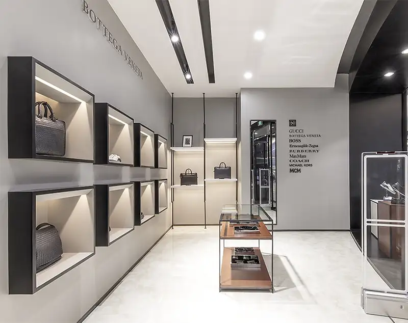 ONI Display Smoked Acrylic Handbag Stands with Antique Gold Trim: Minimalist Luxury Showcase"