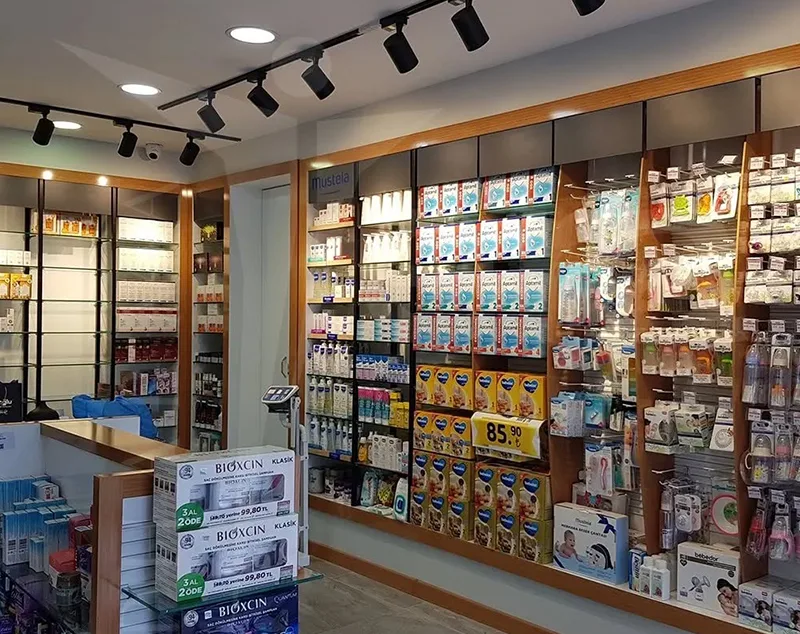 ONI Display Modern Pharmacy Layout Framed with Oak Wood and Track Lighting Accents