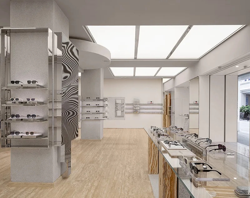 ONI Display Stone-Finish Optical Store Design with Wall Mounted Display Cases